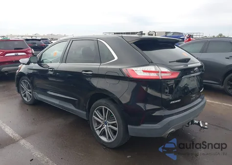 2020 Ford Edge Titanium z USA, uszkodzony, nr VIN 2FMPK4K98LBA14044